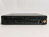 an image of a small black computer with a hard drive on top of it