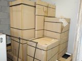 boxes stacked on top of each other in a room