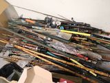 a box full of fishing rods and other fishing equipment