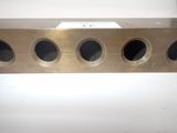 an image of a close up of a metal object on a white surface