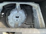 a picture of the inside of a car with the door open