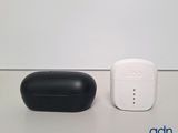 two airpods sitting next to each other on a table