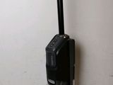 a vacuum that is sitting on the floor next to a wall