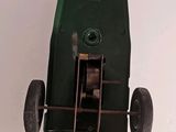 a toy car that is sitting on a white surface