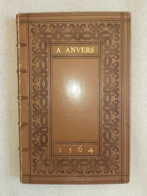 the book is brown and has gold lettering on it