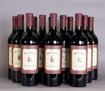 six bottles of wine are lined up in a row on a table