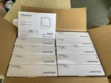 several boxes of electronic devices are stacked on top of each other