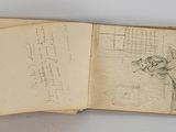 an open book with a drawing of a man on a bench