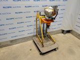 a machine that is sitting on a platform in a room