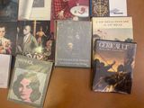 a lot of books that are on the table