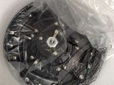 a box with a black and white picture of a clock inside of it