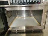 an image of a stainless steel oven with electronic controls