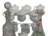 a lot of glass items that are sitting on a table