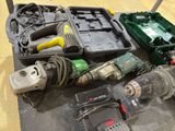many tools that are laying out on the table