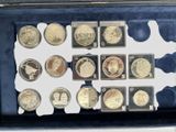 a display case with a lot of coins in it