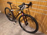 a bike that is leaning against a wall in a room