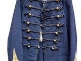 an image of a blue military jacket with gold buttons and a red collar