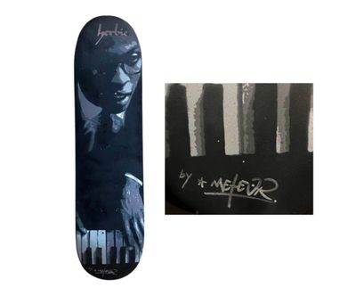 un skateboard sur lequel est représenté un homme