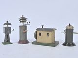 four different types of toy figurines on a white surface