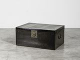a black box sitting on a concrete floor