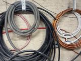 a lot of wires that are laying on the floor