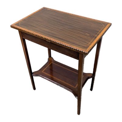 a wooden table with a shelf underneath it