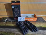 gloves are on a table with a box of gloves on it