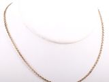 a close up of a necklace on a mannequin mannequin
