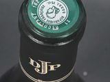 a close up of a bottle of wine with a label on it