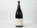 a bottle of wine that is sitting on a table