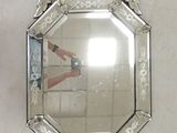 a person taking a picture of themselves in a mirror