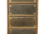 an image of a wooden dresser with four drawers and a mirror on top