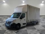 a white truck that is parked on a checkered floor