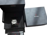a black box with a watch inside of it