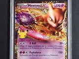 a close up of a pokemon trading card in a plastic case