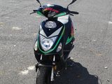 a motorcycle that is parked on the side of the road
