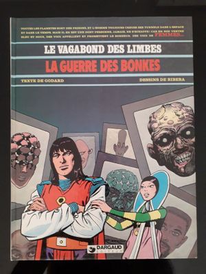 la couverture d'une bande dessinée sur laquelle figurent un homme et une femme debout devant une série de photos