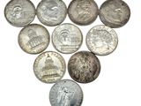 a lot of coins that are arranged in the shape of a heart