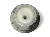 a white and blue vase with a hole in it