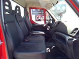 a red car with black seats in the back of it
