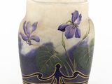 a vase with purple flowers painted on it