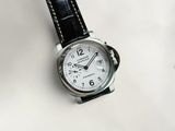 a watch that is sitting on a white table