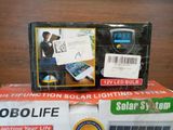 a box with a cell phone sitting on top of it