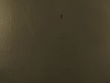 two wall lights that are on the wall in the room