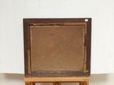a picture of a painting on a wooden easel