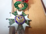 two medals on display in a display case