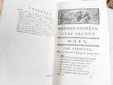 an open book with a picture of a man riding a horse on it