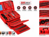 une boîte à outils rouge contenant divers outils