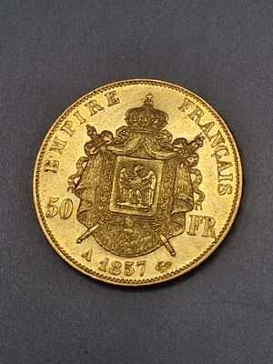 l'image d'une pièce d'or sur laquelle figurent des armoiries