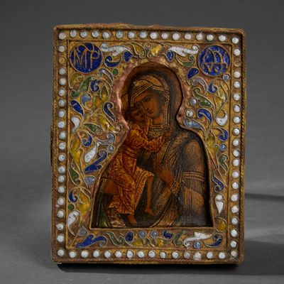 an ornately painted icon of the virgin mary and child